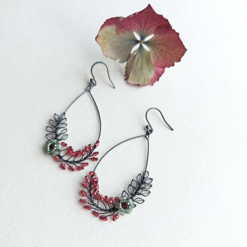 Teardrop foliage earrings by Judith Brown
