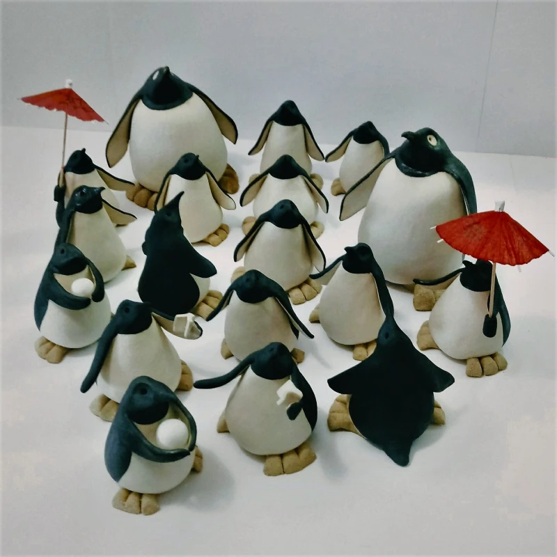 colony of ceramic penguins